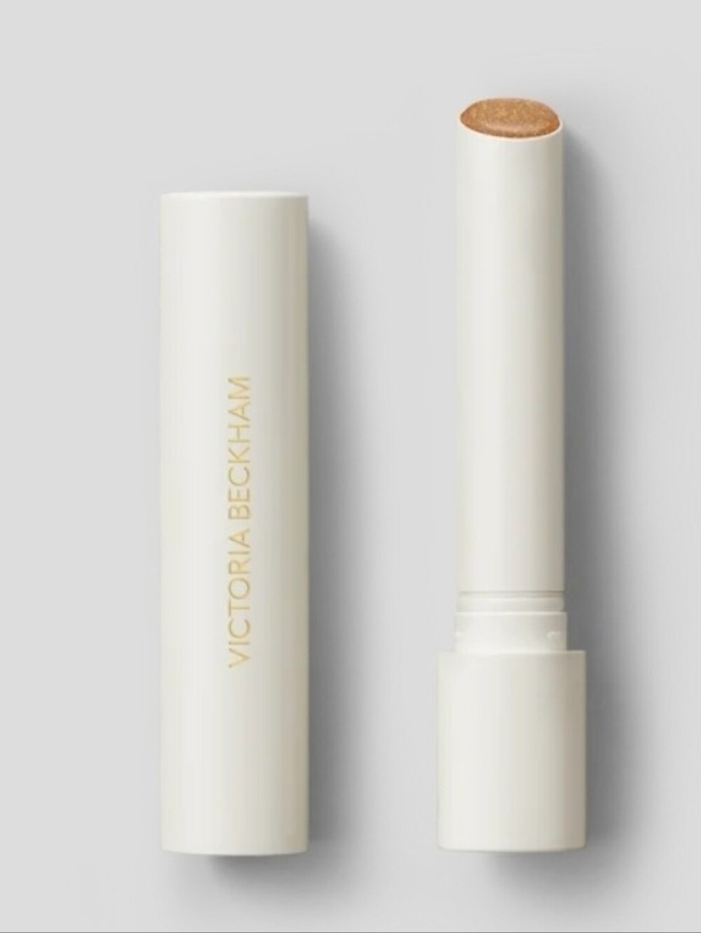 Victoria Beckham Posh Balm Soleil - Neutral sheer golden shimmer. BNIB